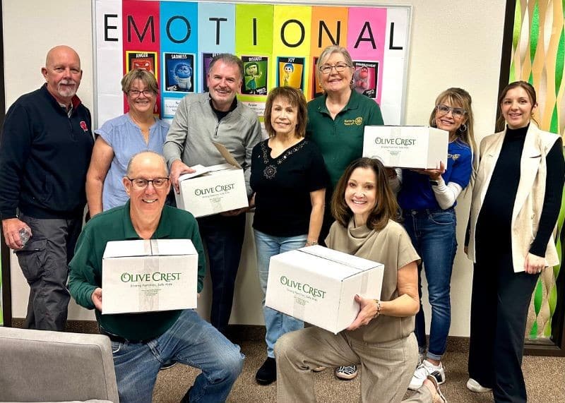 Rotary Club of Green Valley members volunteering at Olive Crest to support children and families in need