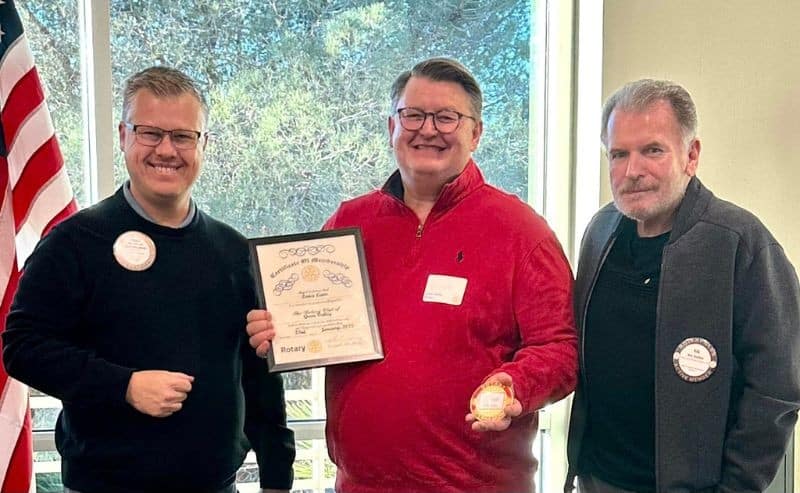 Green Valley Rotary Club welcomes a new member during a meeting